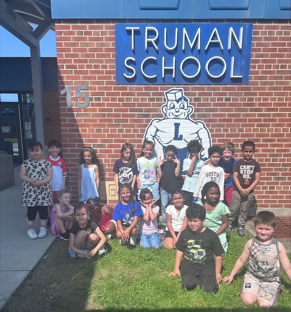 Students sit in front of Truman Elementary