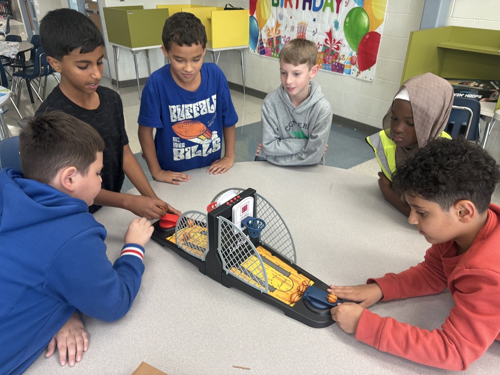 Students celebrate October birthdays.