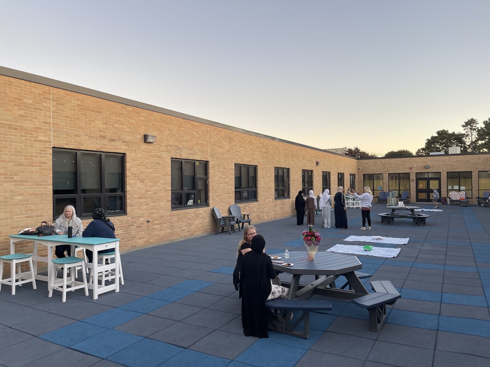 LMS students cut the ribbon to officially open the new courtyard