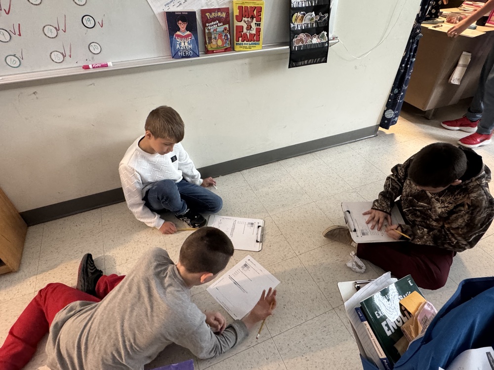 Students work on math in class.