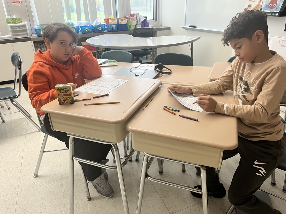 Students work in class.