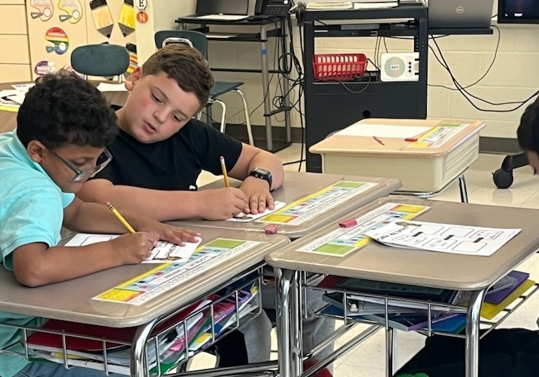 Students work in class.
