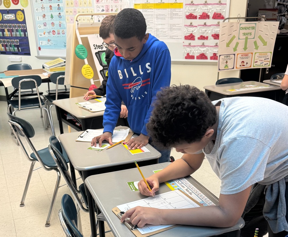 Students work on math in class.
