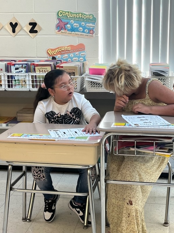 Students work in class.