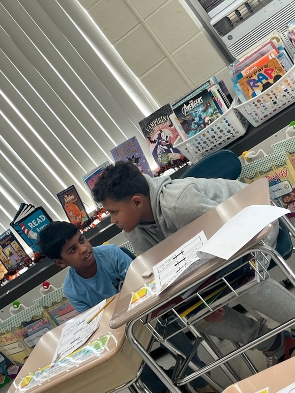 Students work in class.