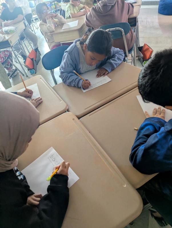 Students work in class.