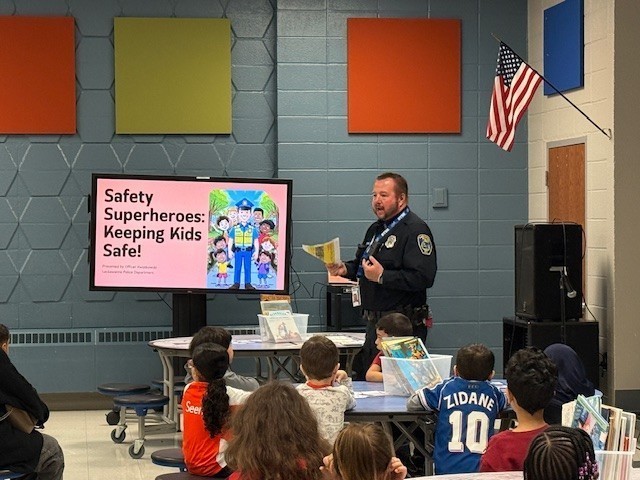 Families gather in cafeteria.