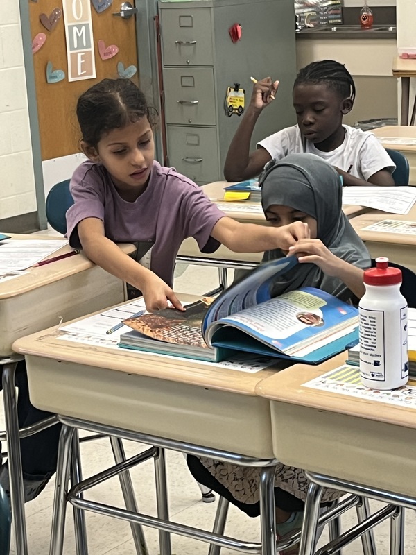 Students work in class.