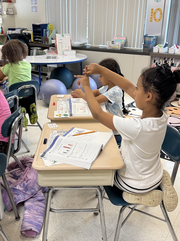 Students work in class.