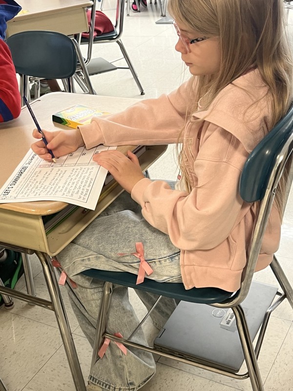 Students work in class.