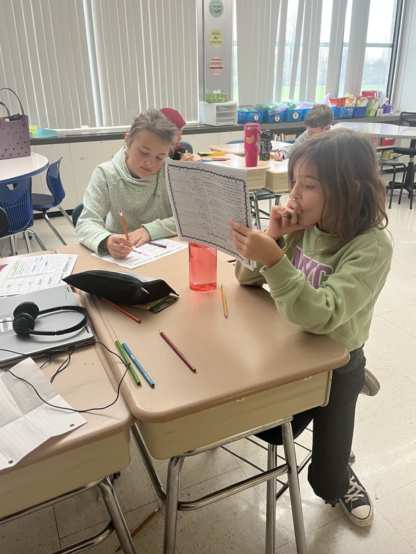 Students work in class.