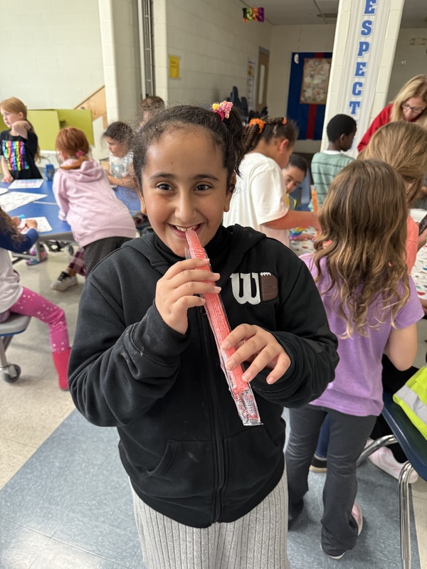 Students celebrate October birthdays.