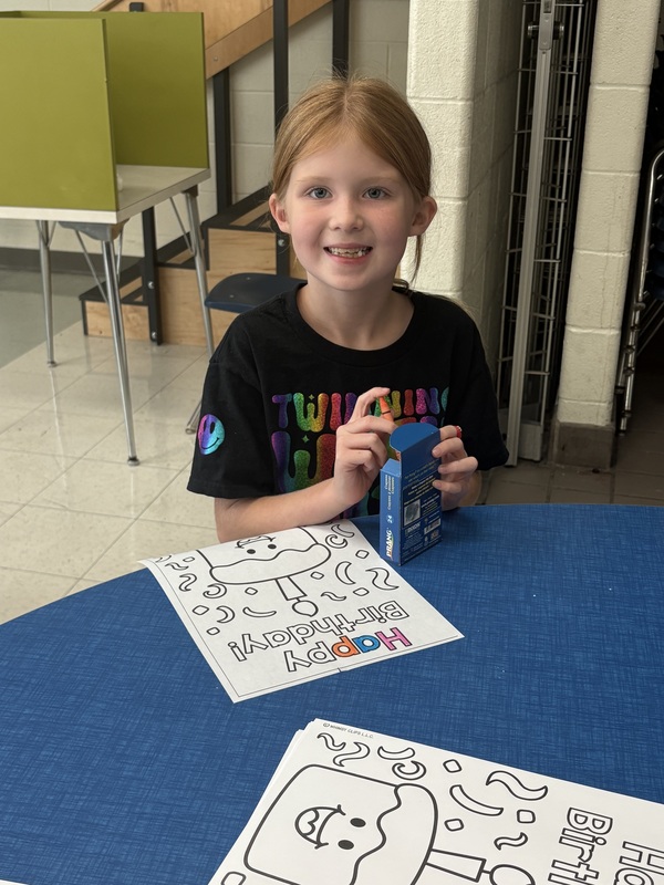 Students celebrate October birthdays.