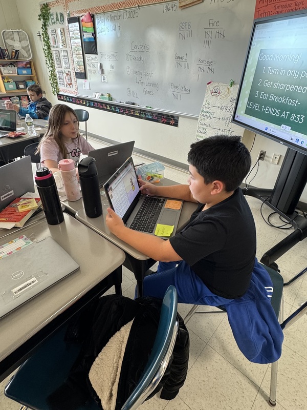 Students work in class.