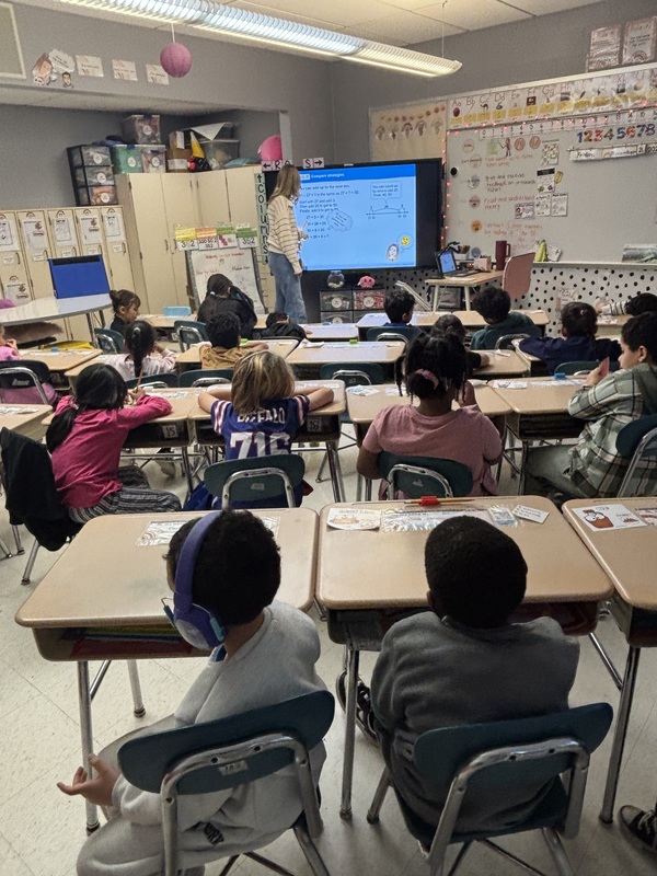 Students work in class.