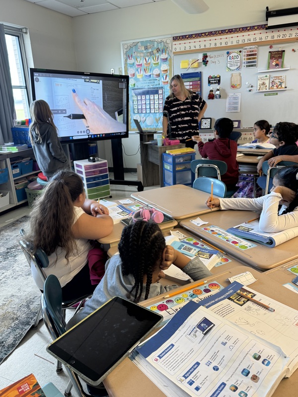 Students work in class.