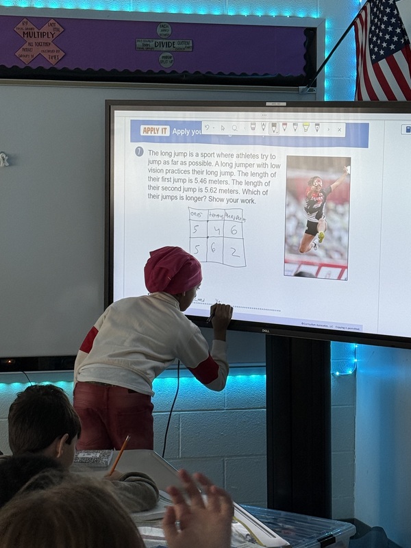 Students work in class.