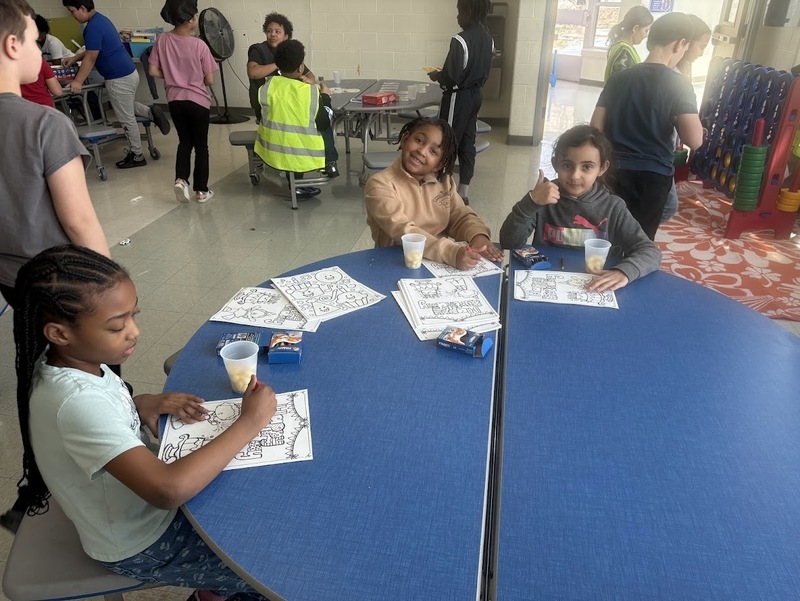 Students play at birthday celebration.