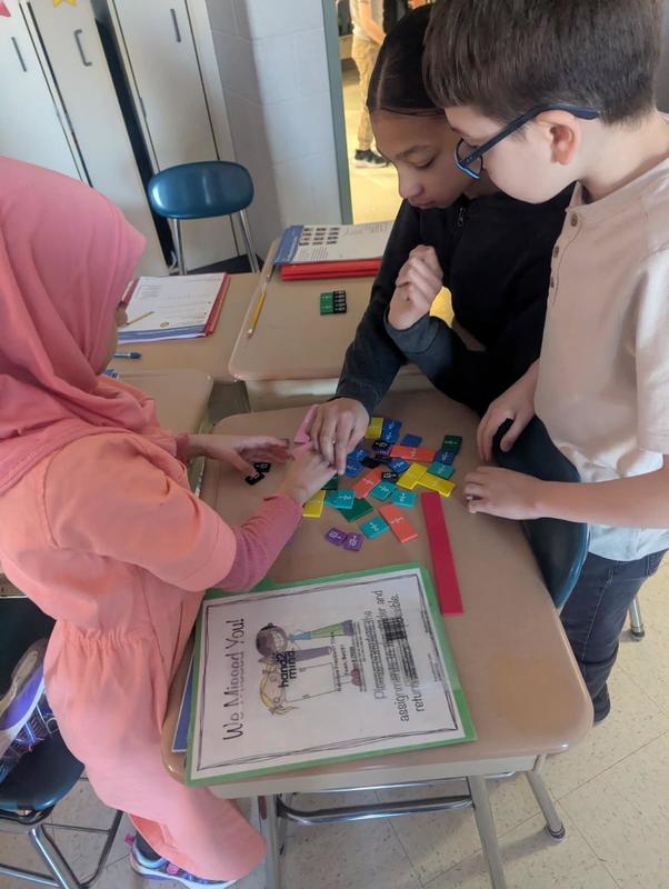 Students work in class.