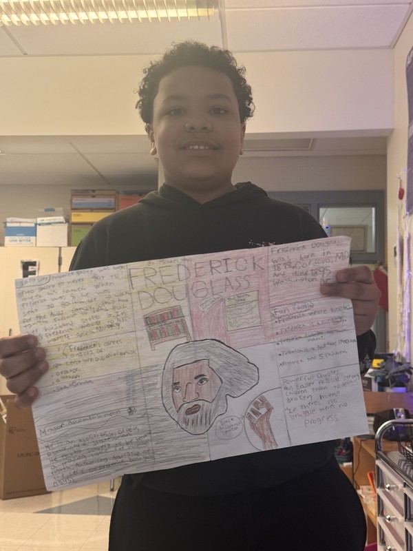 Student holds Black History Month project