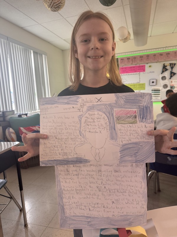 Student holds Black History Month project