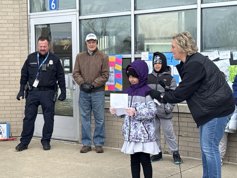 Students read haikus for Mr. Sanders.