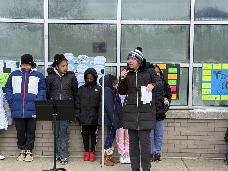 Principal Andreozzi speaks at new playground opening.