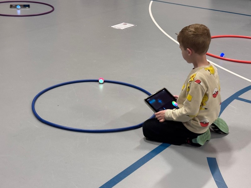 Families participate in STEM and Art Night activities.