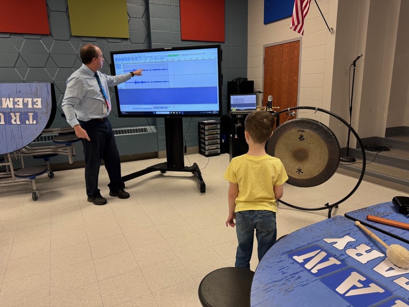 Families participate in STEM and Art Night activities.