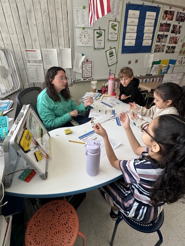 Students work on math in class.