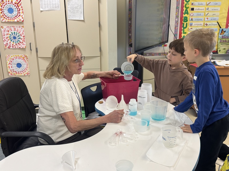Students learn about liquid volume.