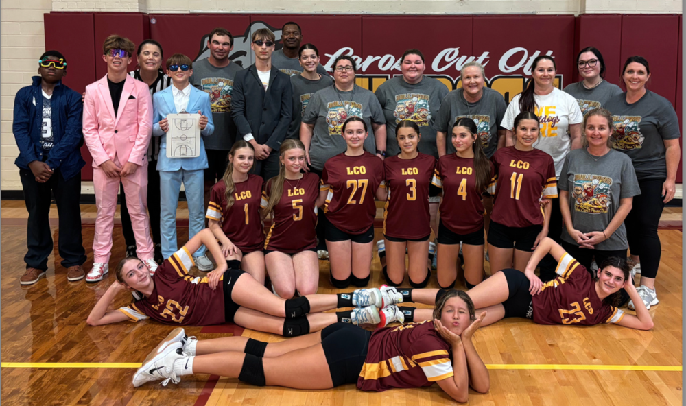 Cover of Bulldog Broadcast Magazine featuring a photo of LCOMS students and staff.