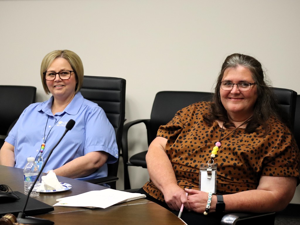 Two female teachers participate in the Employee Advisory Council.