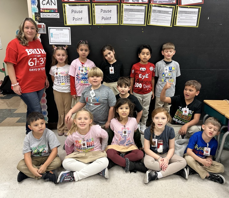 Students with 100 day shirts. 