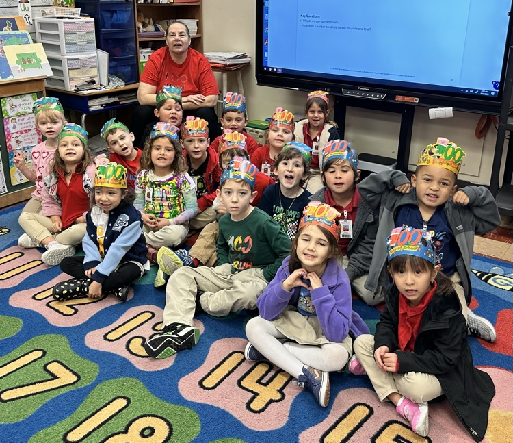 Students with 100 day shirts. 