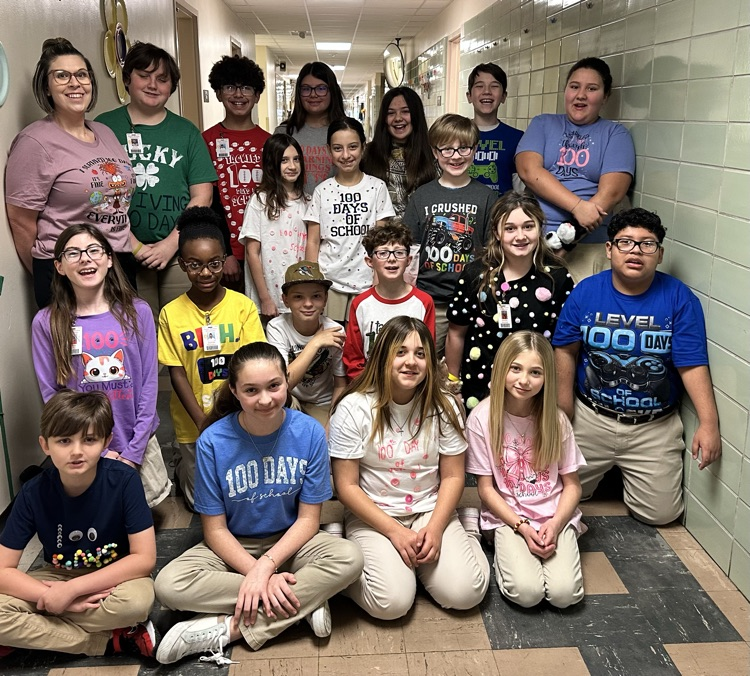 Students with 100 day shirts. 