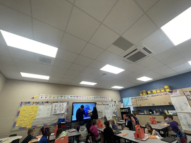 FFA students with our 1st grade students.