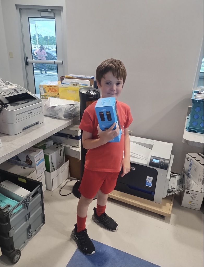 Liam Carter - 3rd place coke sale winner with the prize of a bluetooth speaker