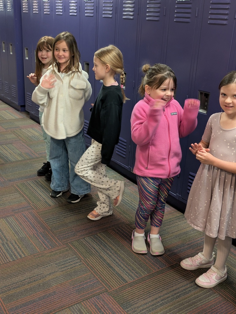 Children dancing in the hallways