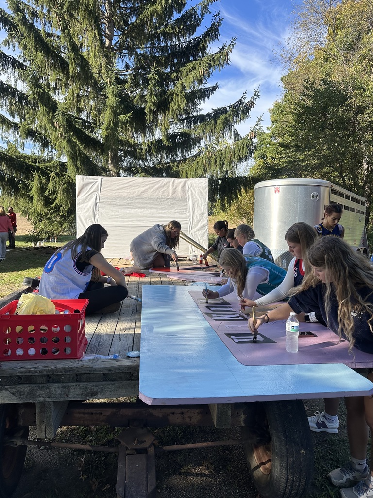 Various images of students building Homecoming parade floats
