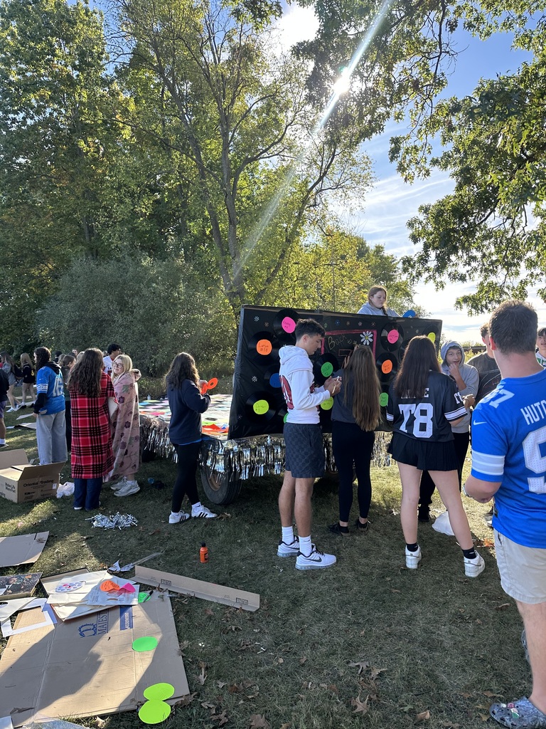 Various images of students building Homecoming parade floats