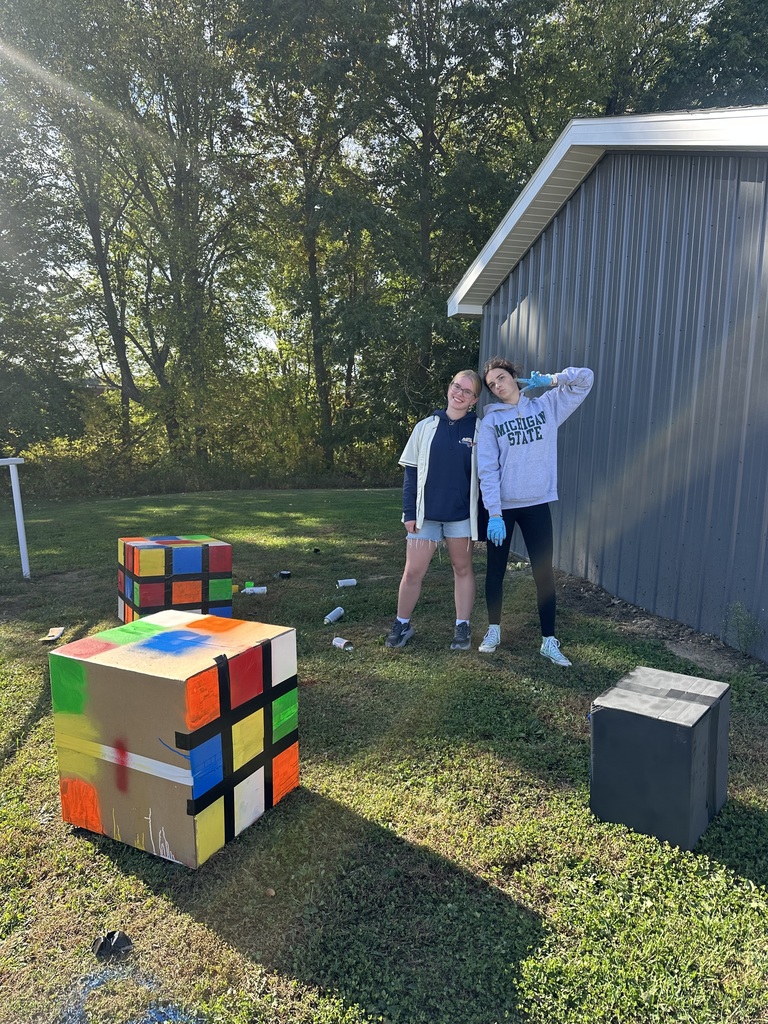 Various images of students building Homecoming parade floats