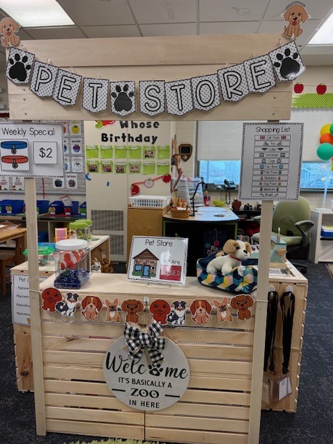 Students playing with their pet center in the classroom