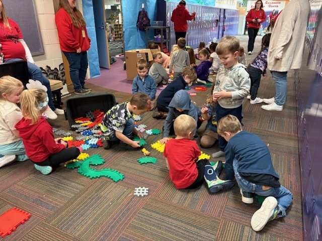 Students playing with blocks as a school reward.