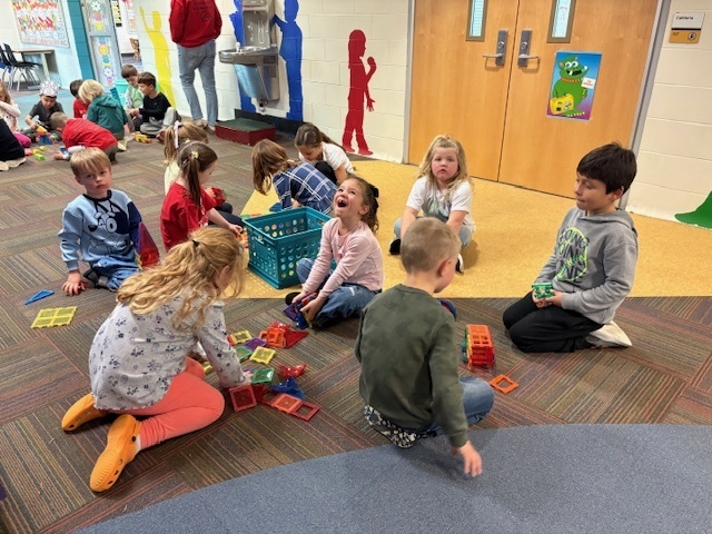 Students playing with blocks as a school reward.