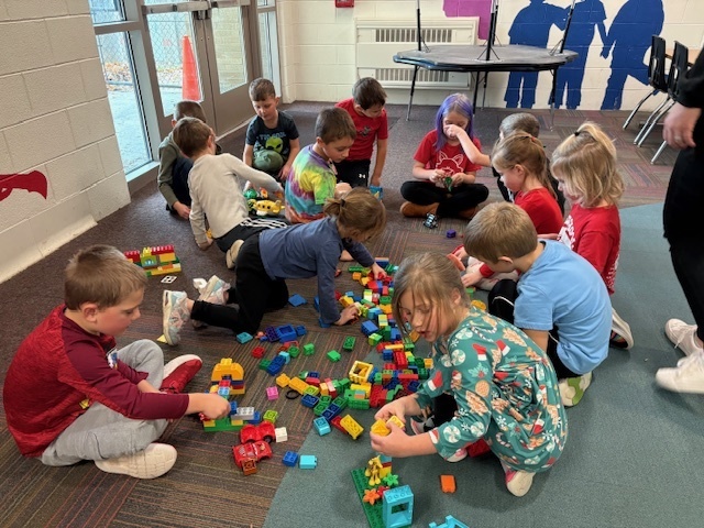 Students playing with blocks as a school reward.