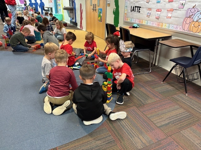 Students playing with blocks as a school reward.