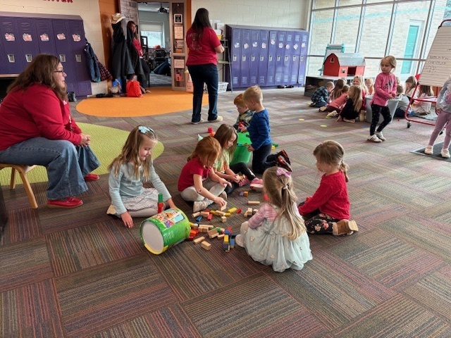 Students playing with blocks as a school reward.