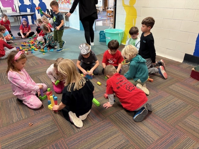 Students playing with blocks as a school reward.