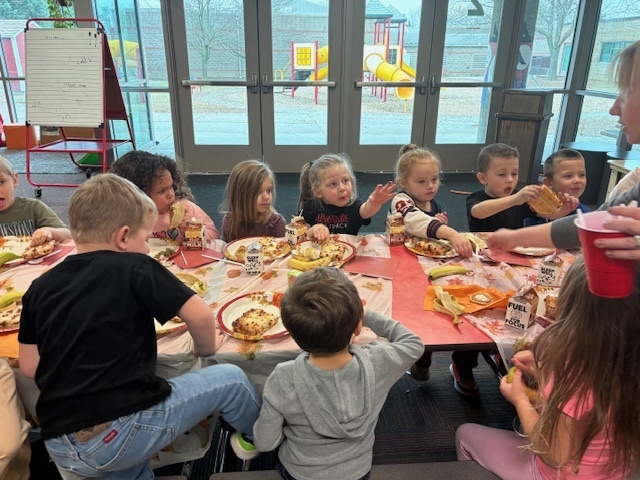 Preschool students enjoying their Friendsgiving meal.